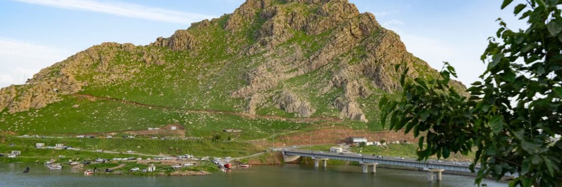 Breathtaking view of a mountain and lake in Kurdistan, perfect for nature enthusiasts and travelers.